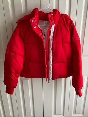 Red puffer coat